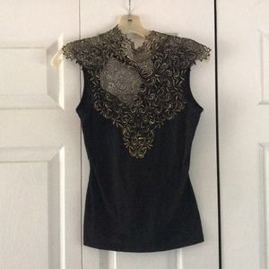 black and gold top